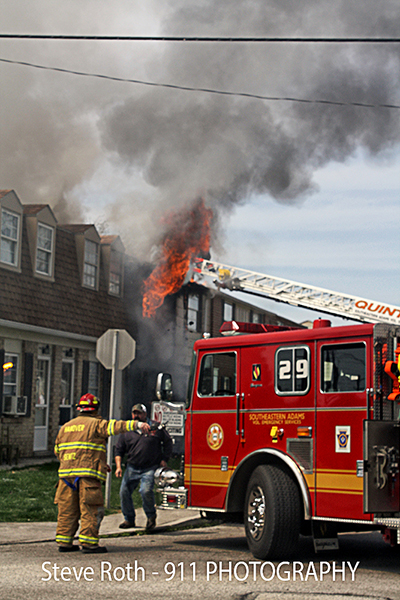 firemen battle Townhouse fire in Hanover PA