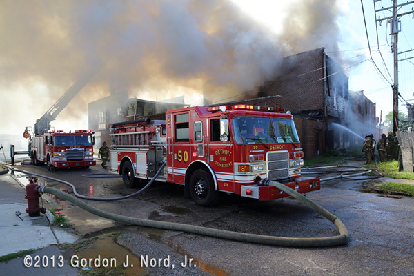 Detroit firemen battle commercial fire