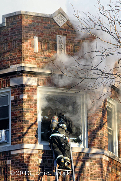 Chicago firefighters battle massive 2-11 alarm fire in apartment building