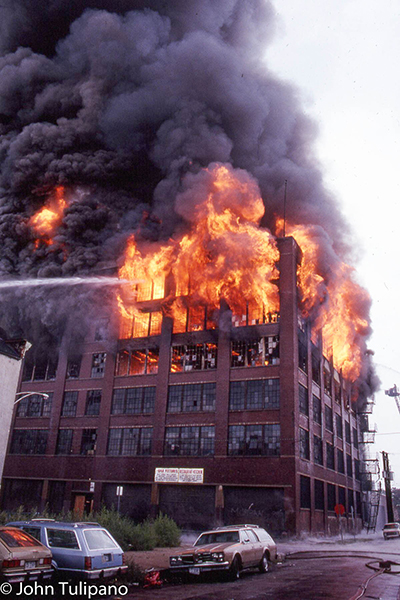 Heavy fire consumes the upper floors. John Tulipano photo