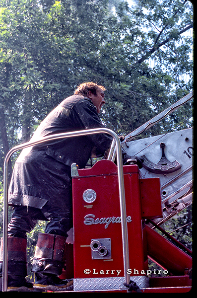 fireman on ladder truck Seagrave