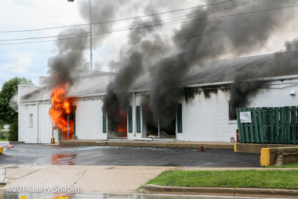 commercial building engulfed by fire
