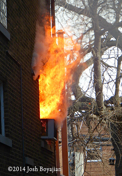 fire blowing out of window