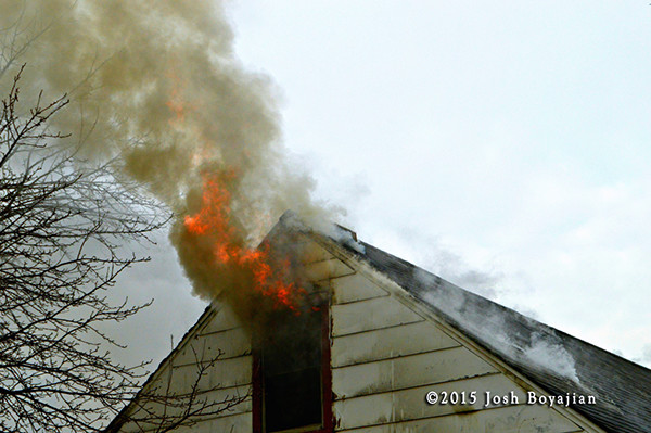 heavy smoke and flames at house fire 