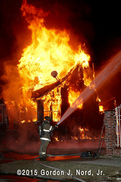 Detroit firemen at night house fire