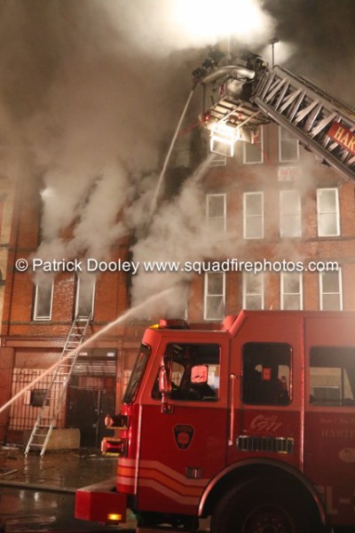 heavy smoke from apartment building fire at night