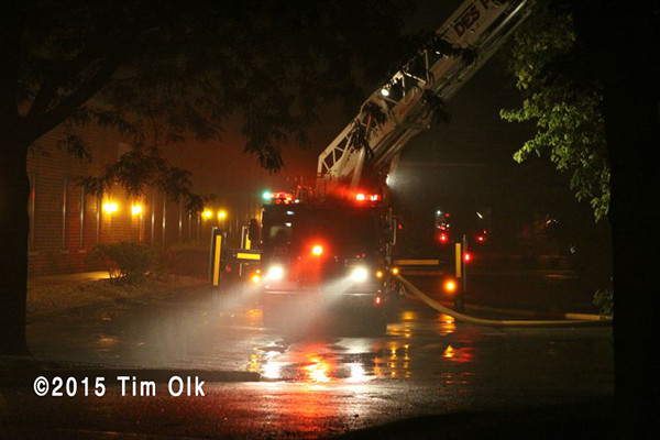 tower ladder working at night fire scene 