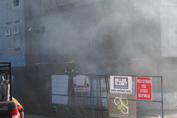 dumpster fire at construction site