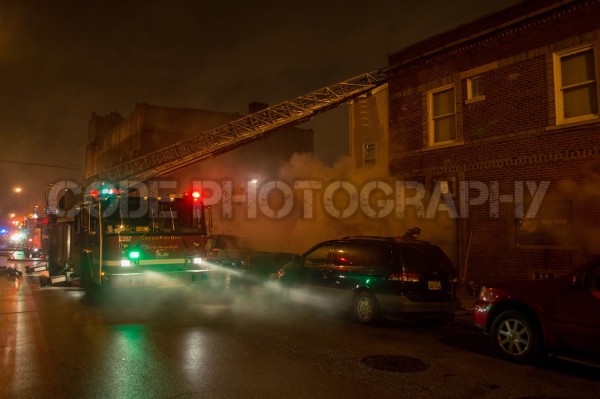 fire truck at a night fire scene