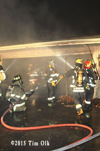 firefighters at night fire scene