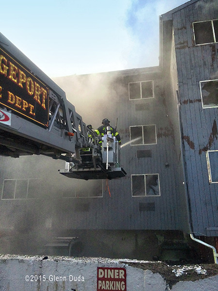 fire trucks at an apartment building fire 