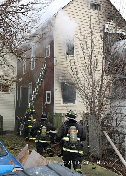 Chicago firefighters after battling a rear porches fire