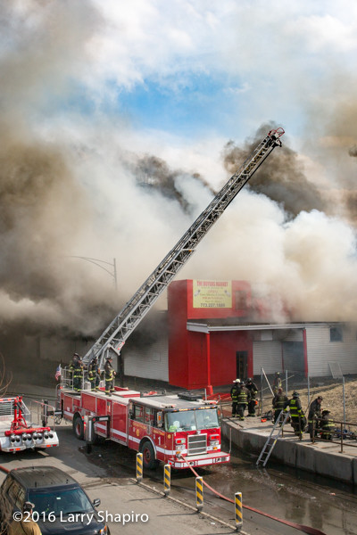 Chicago firefighters battle a huge fire with Pierce aerial