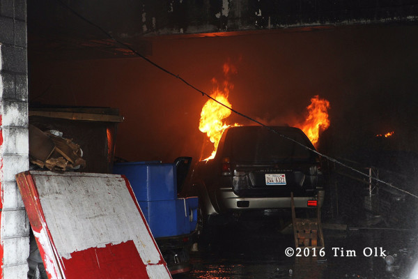 car burning inside a garage