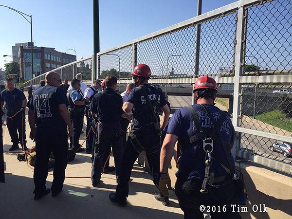 Chicago firefighters save a man threatening to jump onto the highway