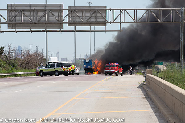 heavy smoke and flames from highway truck crash