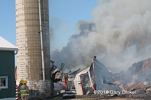 barn and silo destroyed by fire in Canada