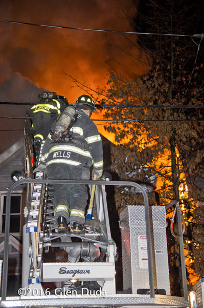 New Haven firefighters battle a house fire
