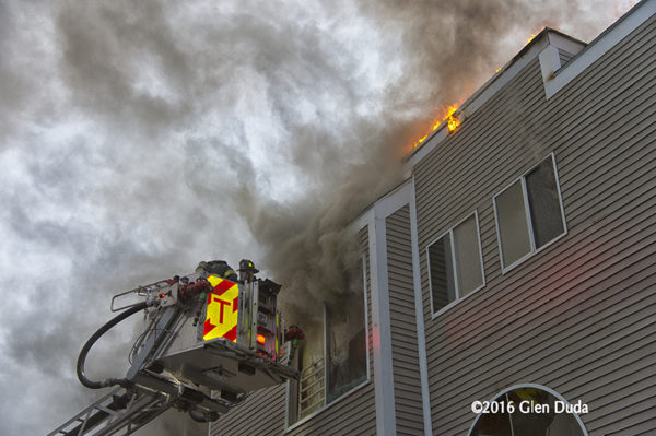 firefighters in Sutphenn tower ladder battle a fire
