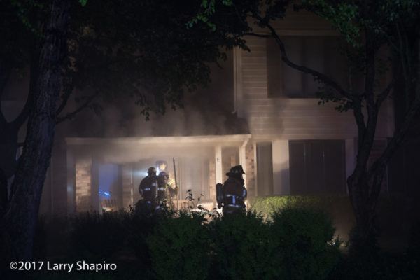 firefighters at house fire