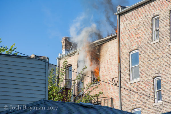 smoke and fire from the 3rd floor window