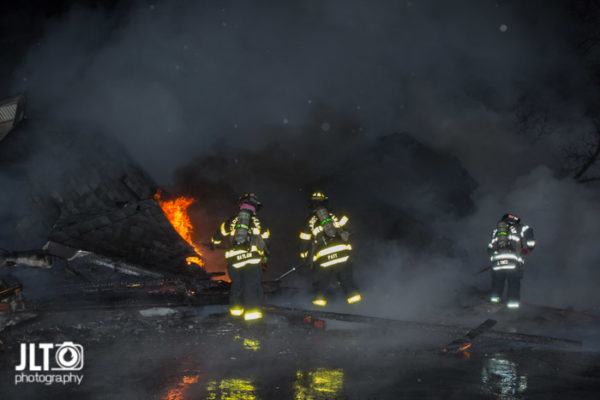 garage destroyed by fire at night