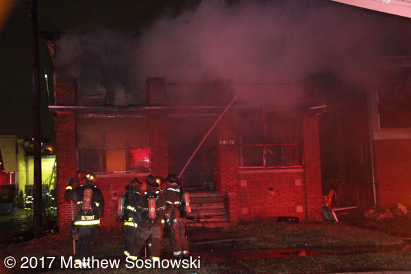 Detroit firefighters battle a house fire