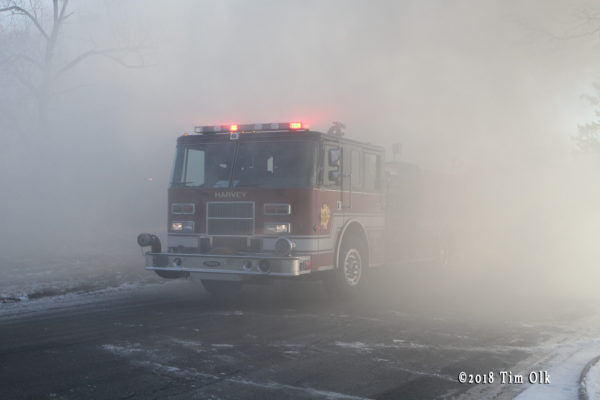 fire engine engulfed in smoke