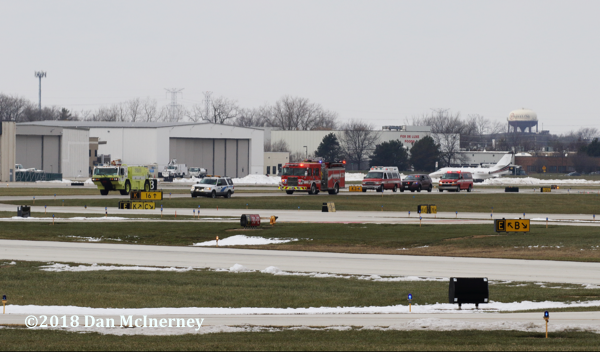 Wheeling FD and Prospect Heights FPD apparatus at airport standby