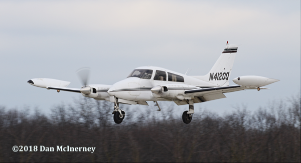 1967 Cessna 310N with unlocked front landing gear  lands at Chicago Executive Airport