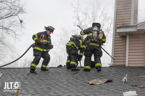 Firefighters at fire scene