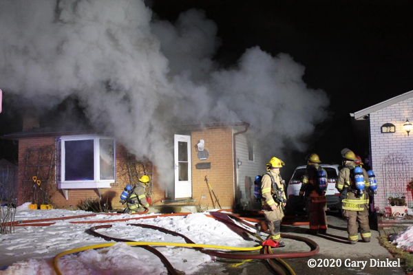 winter house fire at night