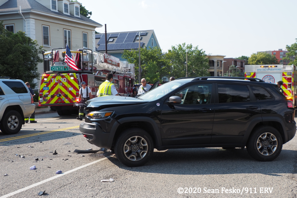 crash scene in Boston involving a fire truck