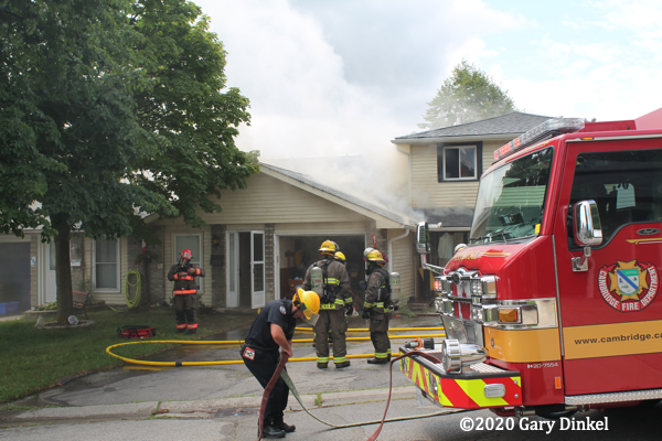 Firefighters in Canada at house fire scene