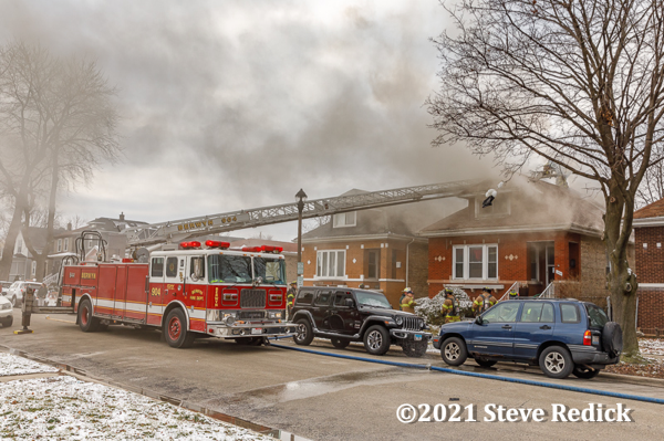 Seagrave aerial ladder at house fire